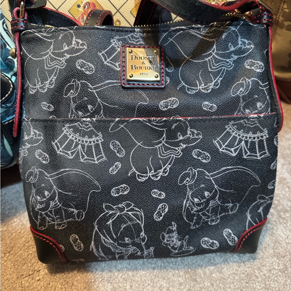 Dooney & Bourke Black Crossbody with Red Trim & Dumbo Sketch Print